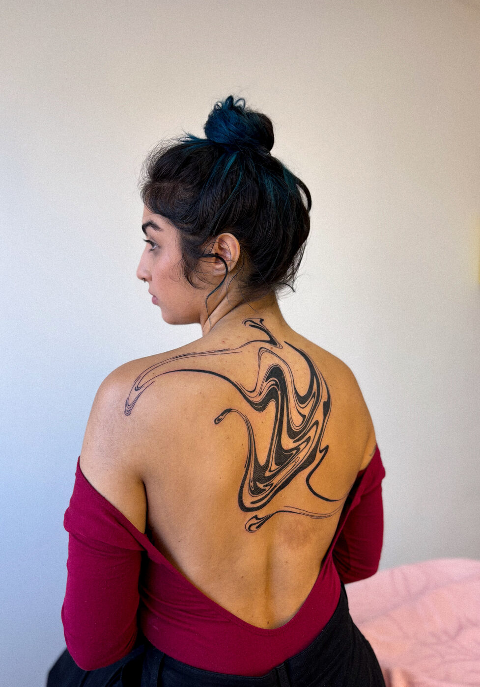 Tatuagem fluida nas costas